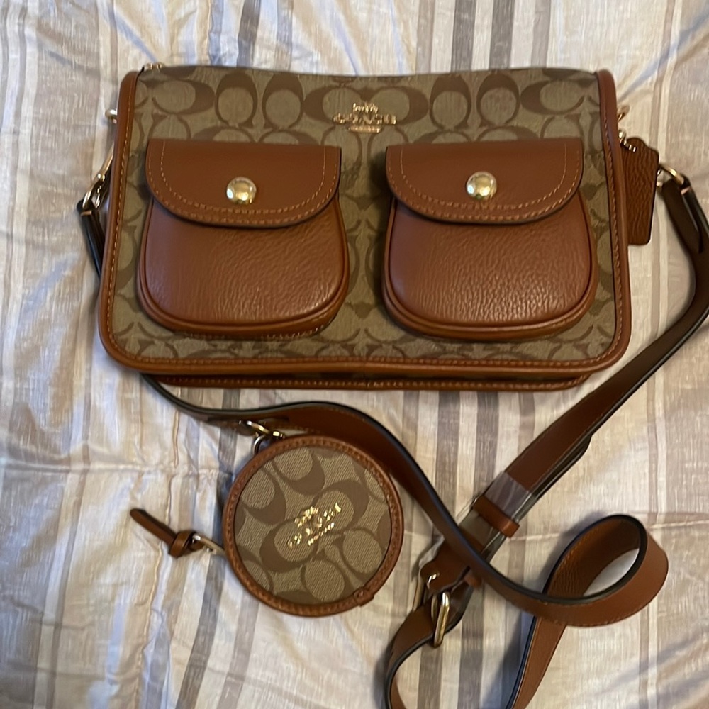 Coach Crossbody NWOT with small change purse attached to strap.